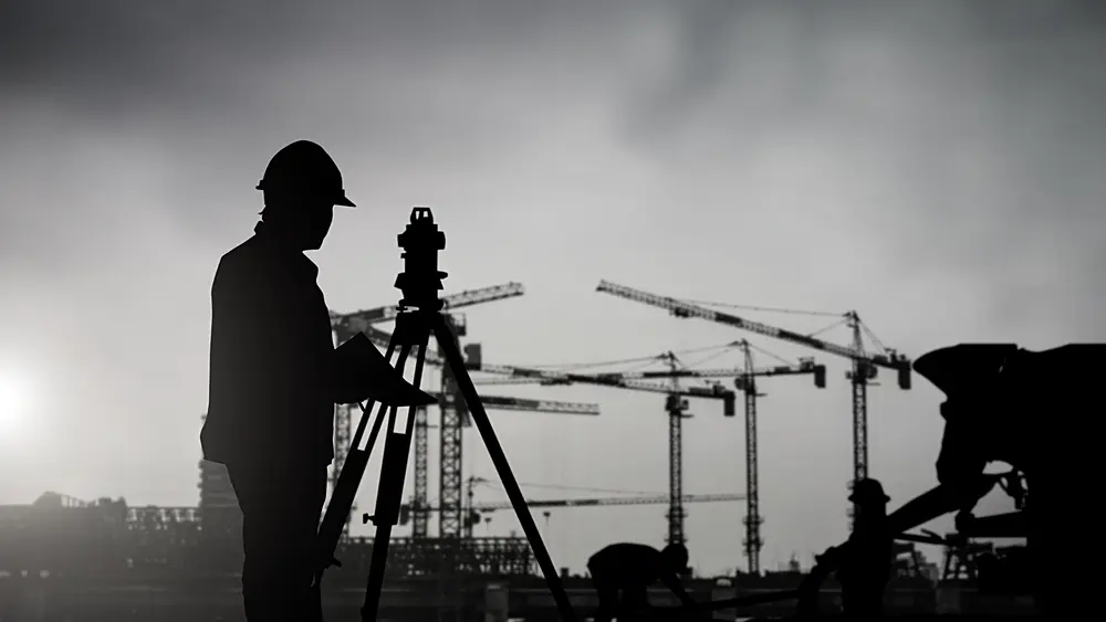 Land surveyor on a commercial development site